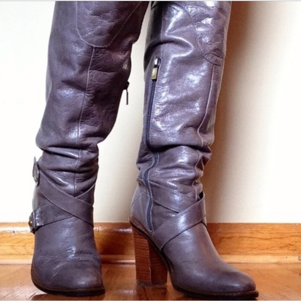 Knee high gray leather boots. Size 10 with buckle detail.